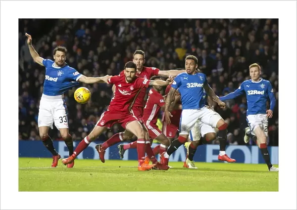 Intense Rivalry: Martin and Tavernier Battle for the Ball in Rangers vs Aberdeen's Premiership Clash at Ibrox Stadium