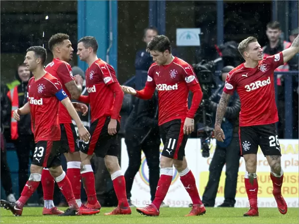 Rangers Euphoric Victory: Jason Cummings Scores and Celebrates with Team Mates in Ladbrokes Premiership Win over Ross County