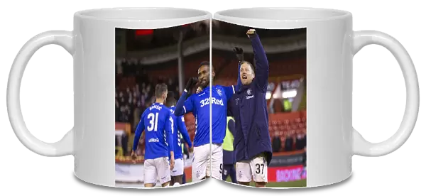 Rangers Jermain Defoe and Scott Arfield Celebrate Scottish Premiership Victory at Pittodrie Stadium