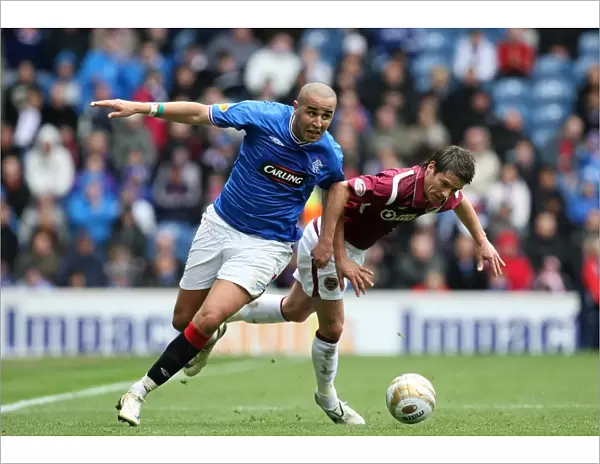 Intense Battle for Supremacy: Bougherra vs Black at Ibrox - Rangers 2-0 Victory over Hearts
