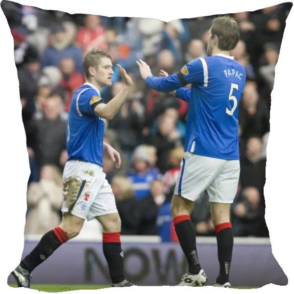 Rangers Steven Davis and Sasa Papac: Unstoppable Duo Celebrates Davis Goal in Rangers 4-0 Victory Over Hibernian at Ibrox Stadium (Scottish Premier League)