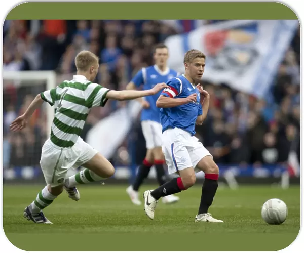 Intense Clash at Ibrox Stadium: Rangers U17s vs Celtic U17s - Andy Murdoch in Action