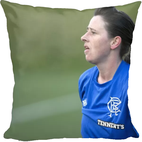 Intense Rivalry: Karen Penglase of Rangers Ladies Faces Off Against Hibernian Ladies in Scottish Women's Premier League Soccer Match