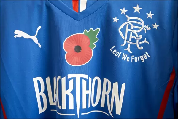 Rangers Football Club: Lest We Forget - Remembrance Day Tribute in SPFL League 1: Rangers vs Airdrieonians at Ibrox Stadium (Scottish Cup Winners 2003) - Poppies and LEST WE FORGET on Home Shirts