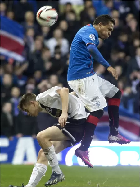 Rangers Arnold Peralta Leaping to Head the Ball at Ibrox Stadium - Scottish League One: Rangers vs Ayr United
