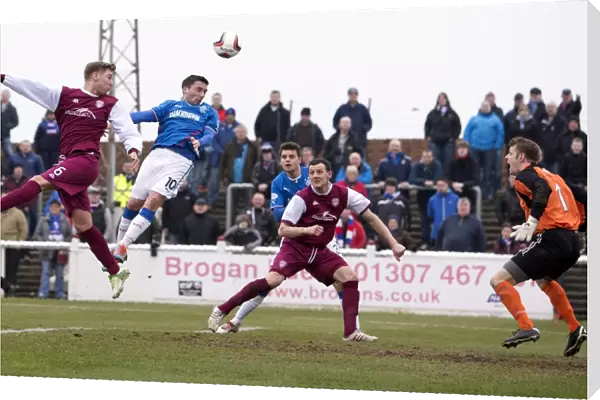 Rangers Nicky Clark Scores the Winning Header: Scottish Cup Victory at Arbroath's Gayfield Park (2003)