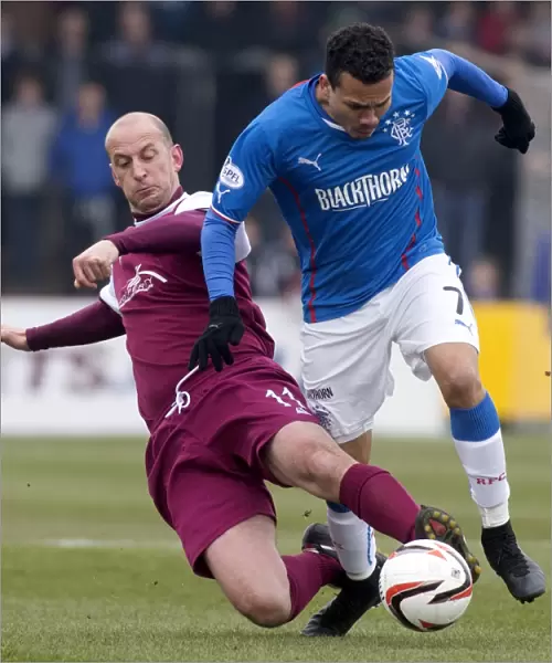 Rangers Peralta Tackled by Sheerin in Scottish League One Clash