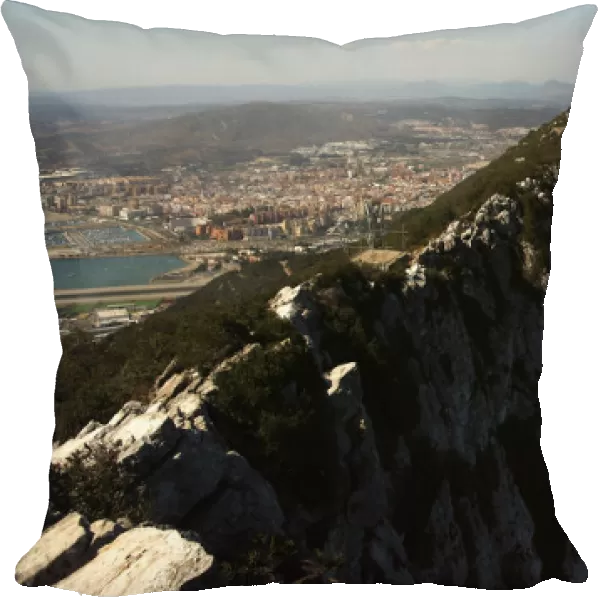 The Spanish city of La Linea de la Concepcion, and the top of the Rock, a monolithic
