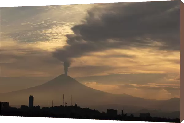 Popocatepetl volcano spews a cloud of ash and steam high into the air in Puebla
