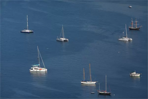 Sailboats and small ships are seen in the bay in front of Charlotte Amalie