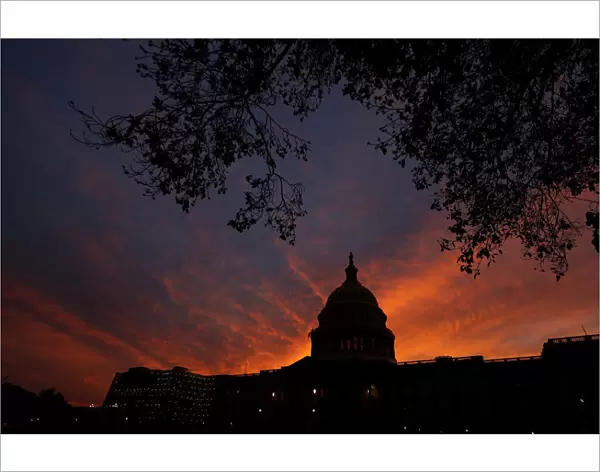 A view shows the U. S. Capitol building during sunset in Washington