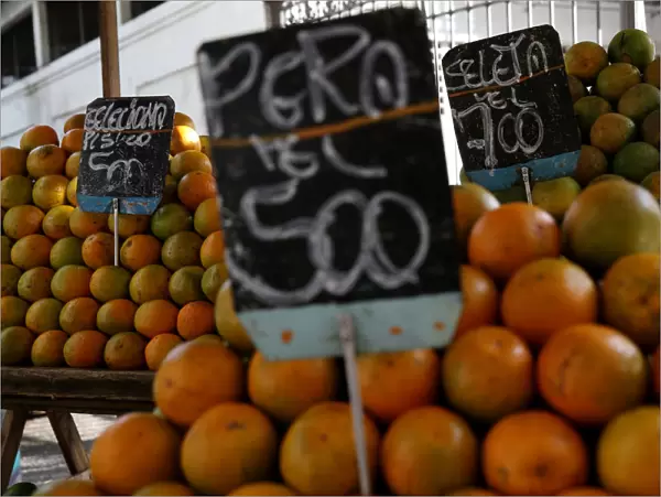 Oranges are displayed for sale at a street market in Rio de Janeiro