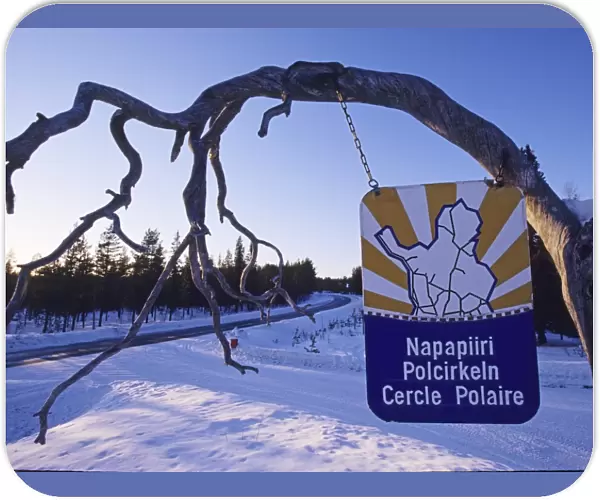 Sign indicating entry to Arctic Circle north of Kuusamo Finnish Lapland winter