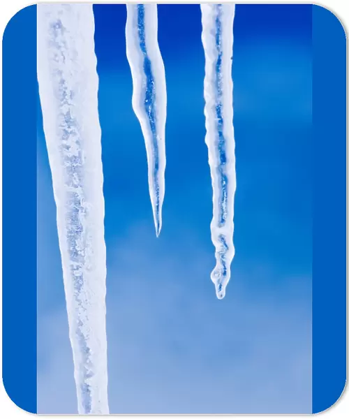Icicles hanging from iceberg stuck in the fast ice of the Weddell Sea around Snow