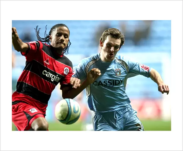 Competing for the Championship: A Battle Between Coventry City's Jay Tabb and Queens Park Rangers Michael Mancienne (Ricoh Arena, 2008)