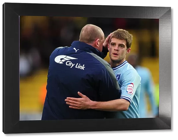 Andy Thorn and Martin Cranie: Coventry City's Jubilant Moment after Securing Victory over Watford (17-03-2012)