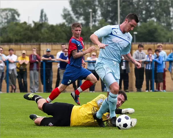Coventry City's Roy O'Donovan Outsmarts Hinckley United's Goalkeeper during Pre-Season Friendly