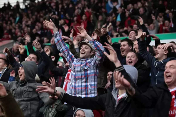 Passionate Clash: Stoke City vs Arsenal Fans at Britannia Stadium, April 28, 2012