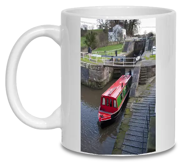 Narrowboat moving through canal staircase lock, Bunbury Locks, Shropshire Union Canal, Bunbury, Cheshire, England