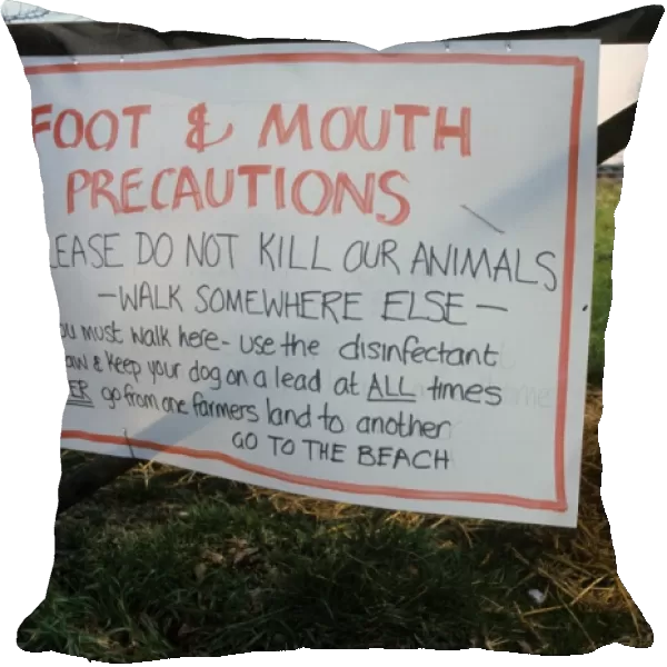 Foot and Mouth Precautions sign on farm gate, with walker using disinfected straw