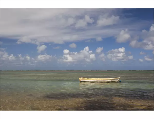 Puerto Rico, East Coast, Luquillo, Playa Luquillo Beach, seascape with small boat