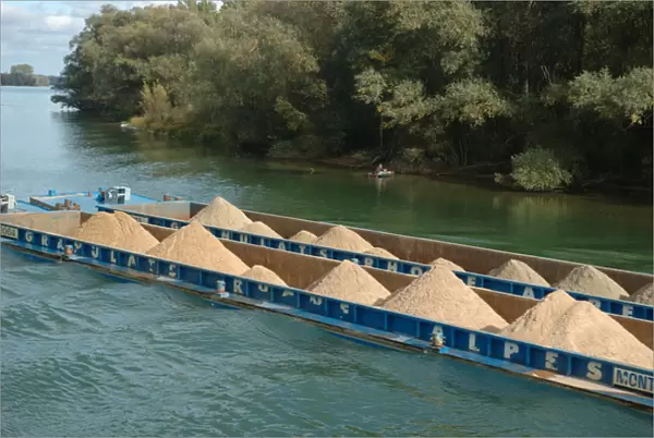 03. France, Saone River, barge hauling sand (Editorial Usage Only)