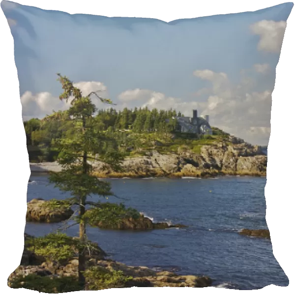 North America, USA, Maine, Acadia National Park. A view of a sailbot and a mansion