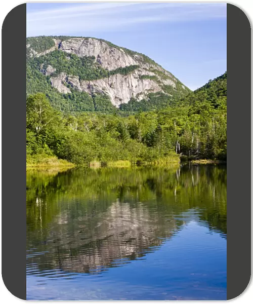 The cliffs of Mount Willey as seen from Willey Pond in New Hampshires Crawford