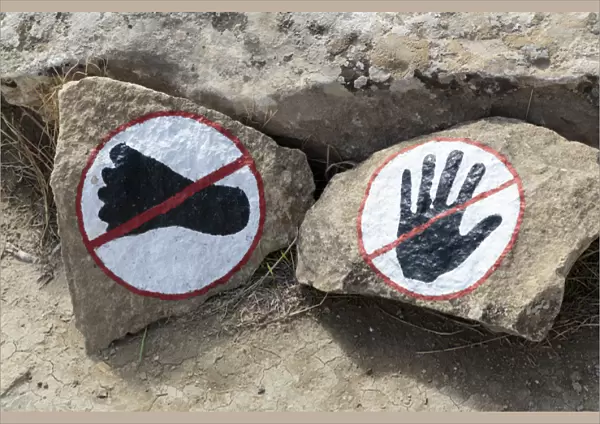 Azerbaijan, Qobustan. A warning to not touch or walk on the rocks at Gobustan National