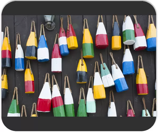 Bar Harbor Maine colorful buoys on wall for sale and state specialty souvenirs for