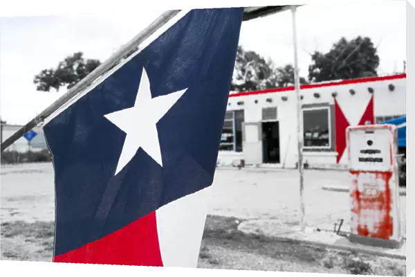 Flag at an antique gas station, Adrian, Texas, USA. Route 66