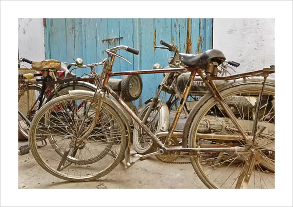 Group of bicycles in gulley (alley) Delhi, India