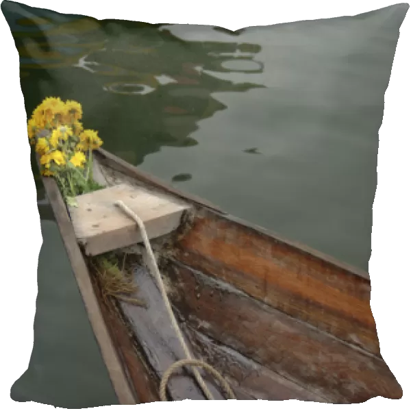Asia, Vietnam. Traditional Vietnamese boat with flowers on the bow, Hoi An, Quang
