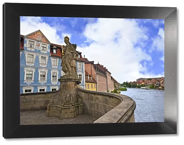 Bamberg, Germany, Bavaria, Queen Kunigunda statue stands over the Regnitz river