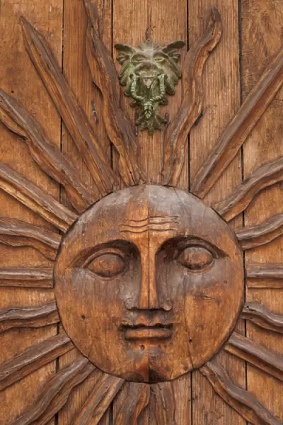 Mexico, San Miguel de Allende. Sun carving on doorway