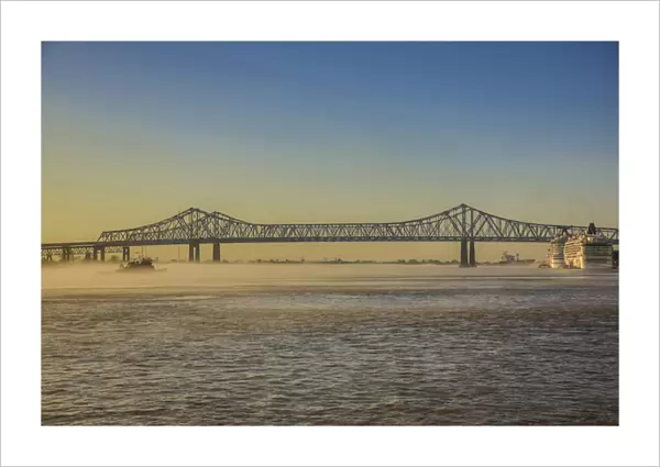 New Orleans, Louisiana. Fog over the Mississippi River at the Crescent City Connection (CCC)