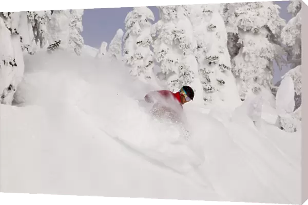 David Downing skis powder at Whitefish Mountain Resort in Whitefish, Montana, USA MR