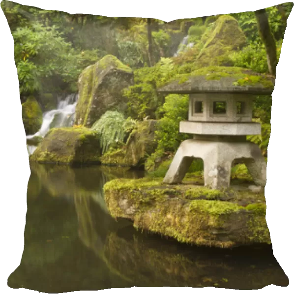 Stone lantern at koi pond at the Portland Japanese Garden, Oregon