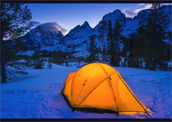 Winter camp at dusk under the Tetons, Grand Teton National Park, Wyoming USA