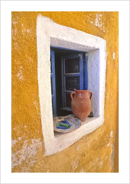 Greece, Santorini, Oia. Pottery in window. Credit as: Jim Nilsen  /  Jaynes Gallery  /  DanitaDelimont
