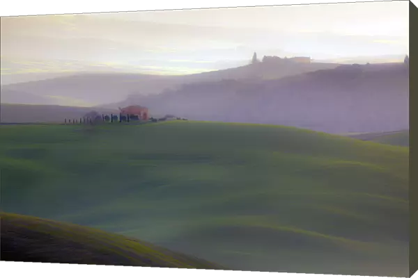Europe, Italy, Val d Orcia. Sunrise over misty valley