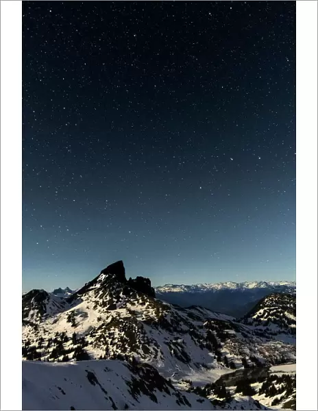 Canada, British Columbia, Garibaldi Provincial Park. Black tusk under moonlight and a starry sky