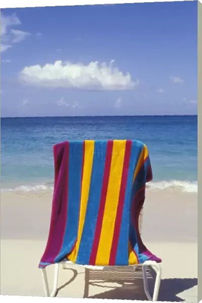 Caribbean, Grenada, Grand Anse beach. Beach towel on chair