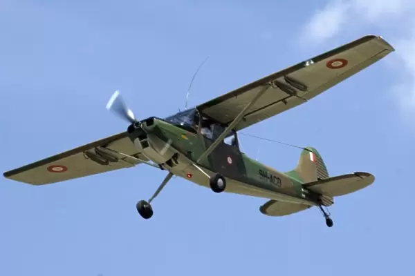 Cessna OE-1 Bird Dog at CAF Air Show showing Maltese markings in the sky
