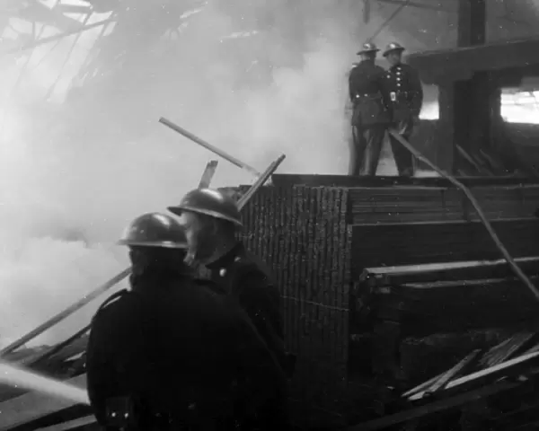 Blitz in London -- Howards Timber Yard, Poplar, WW2