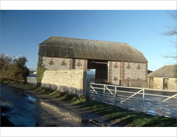 Flint and brick barn at Binsted Nursery Farm, Walberton, West Sussex