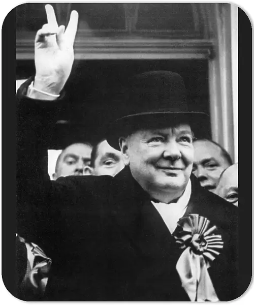 (1874-1965). English statesman and writer. Photographed flashing his V for Victory sign during WWII