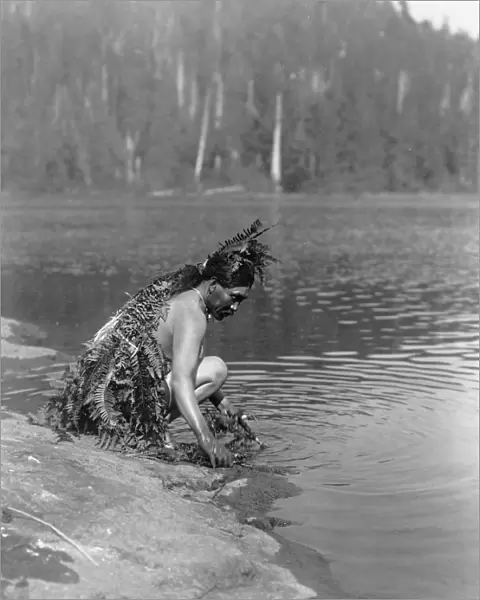 CURTIS: NOOTKA MAN, c1910. A Nuu-chah-nulth (formerly Nootka) takes a ritual bath
