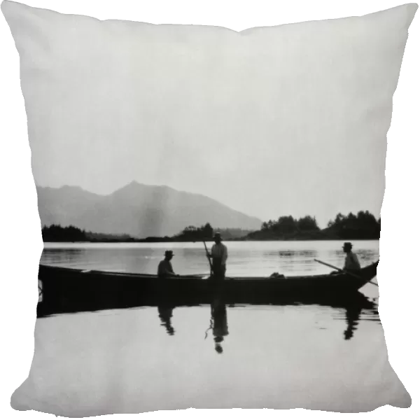 ALASKA: DUGOUT CANOE, 1905. Tlingit Native American men in a large dugot canoe