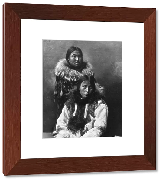 ALASKA: ESKIMOS, c1903. Two Eskimo women in traditional fur clothing, Nome, Alaska